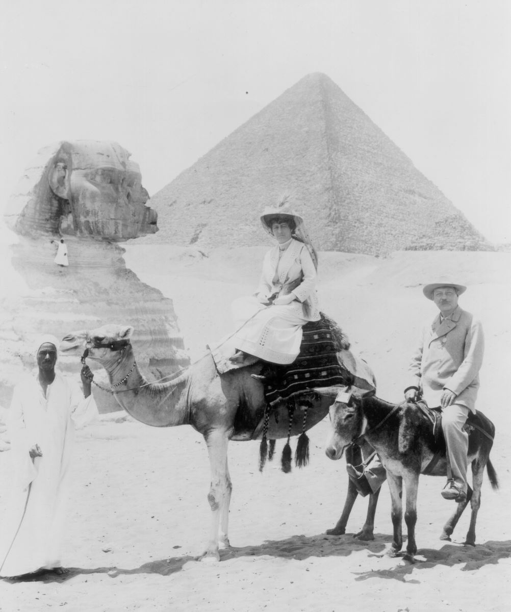 Conan Doyle in Egypt with a pyramid and the sphinx behind him